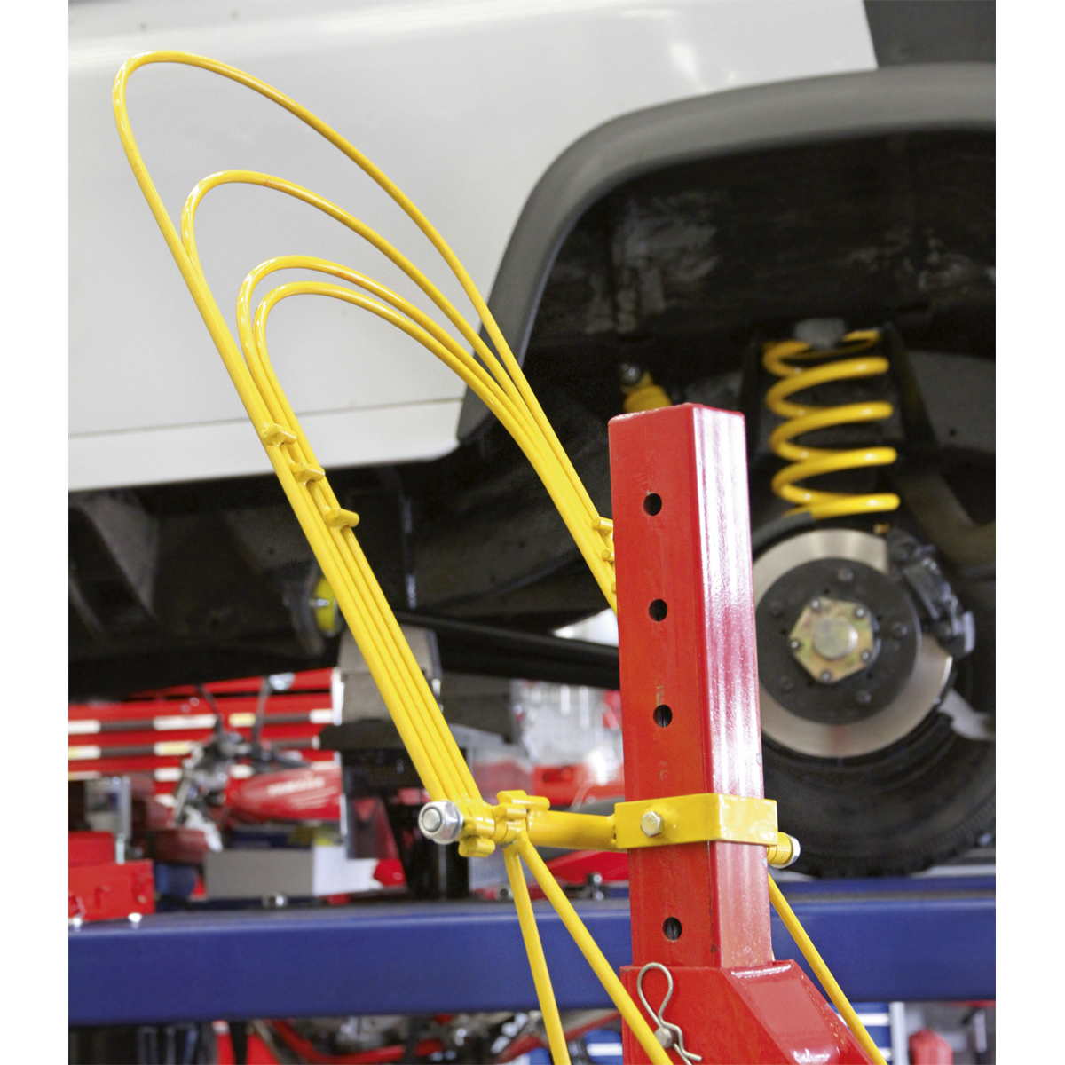 Restraint System for Coil Spring Compressors RE23RS