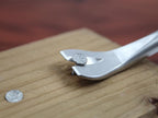 Tack Lifter                                                                     